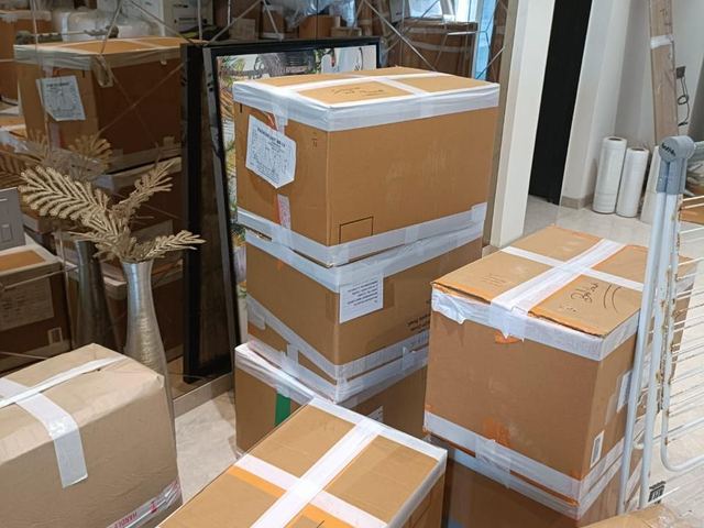 Cartons sealed and labelled for the move